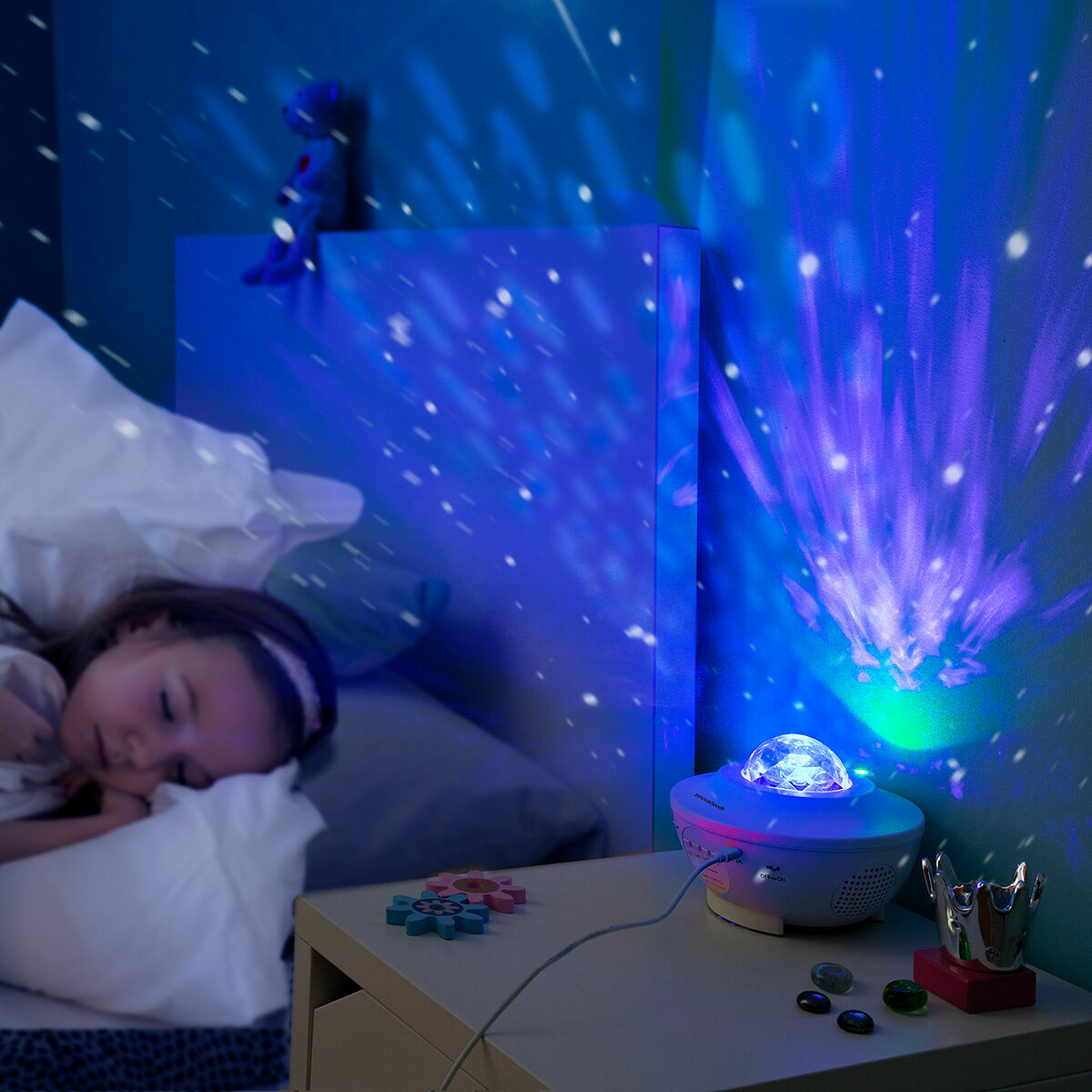 LED star projector with speaker