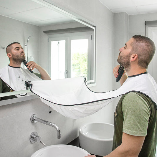 Beard-trimming bib with suction cups